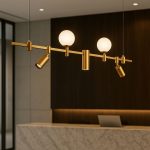 Modern Brass Linear Pendant Light – Dual Globe & Spotlight Design - Image 2